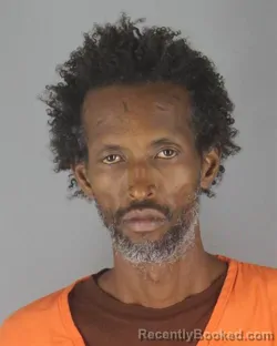 Mugshot of MOHAMED ABDI SHIDE booked in Hennepin County, Minnesota on July 11, 2026