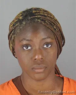 Mugshot of NAOMI BAHMU FREEMAN booked in Hennepin County, Minnesota on July 12, 2026