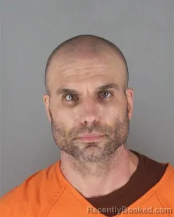 Mugshot of RYAN ERNEST BAGLEY booked in Hennepin County, Minnesota on July 12, 2026