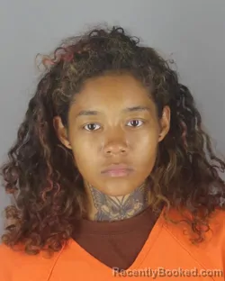 Mugshot of AZIAH NACHE RUNNELS booked in Hennepin County, Minnesota on July 12, 2026