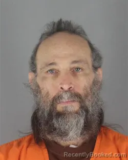 Mugshot of DANNY SCOTT TANNER booked in Hennepin County, Minnesota on July 12, 2026