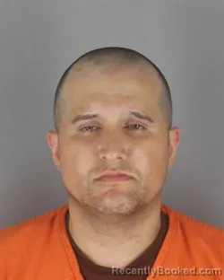 Mugshot of JORGE ANDRES GARCIA booked in Hennepin County, Minnesota on July 13, 2026