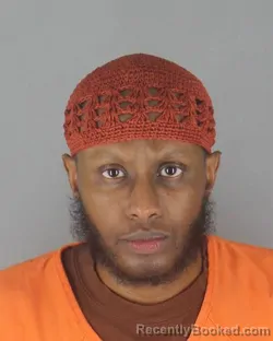 Mugshot of SAED AHMED MUSE booked in Hennepin County, Minnesota on July 13, 2026