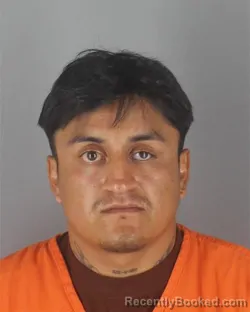 Mugshot of BRYAN ISRAEL PATINO CARACUNDO booked in Hennepin County, Minnesota on July 13, 2026