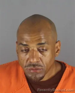 Mugshot of SHANGE MARTIN MCNEAL booked in Hennepin County, Minnesota on July 13, 2026
