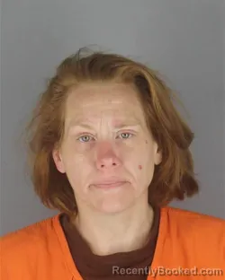 Mugshot of TIFFANY LOUISE BERG booked in Hennepin County, Minnesota on July 13, 2026