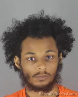 Mugshot of TALIB AMEEN REID booked in Hennepin County, Minnesota on July 13, 2026