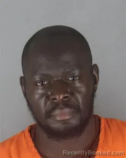 Mugshot of ENOCK ONDEGO OKEMWA booked in Hennepin County, Minnesota on July 13, 2026