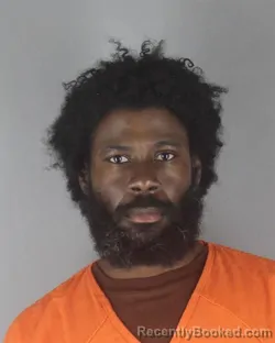 Mugshot of JUNIOR MANTANA CLARKE booked in Hennepin County, Minnesota on July 13, 2026