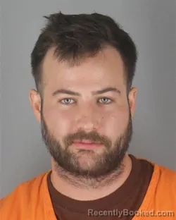 Mugshot of TRAVIS MICHAEL GADBOIS booked in Hennepin County, Minnesota on July 14, 2026
