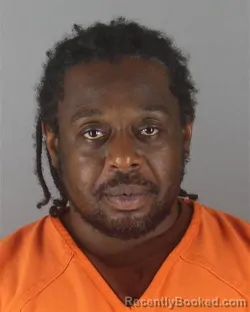 Mugshot of ARON RASHID TITUS OWENS booked in Hennepin County, Minnesota on July 14, 2026