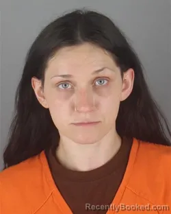 Mugshot of CARA LYNN BERG booked in Hennepin County, Minnesota on July 14, 2026