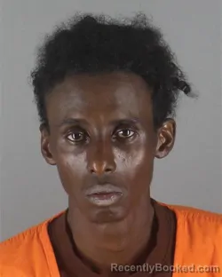 Mugshot of HASSAN IBRAHIM AWIL booked in Hennepin County, Minnesota on July 14, 2026