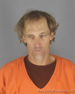Mugshot of JOSHUA ADAM GLOMSKI booked in Hennepin County, Minnesota on July 15, 2026