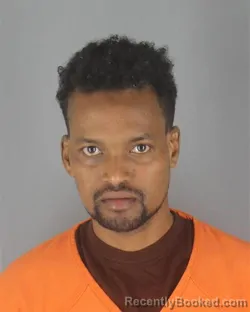 Mugshot of KHADAR DUBAT DOL booked in Hennepin County, Minnesota on July 15, 2026