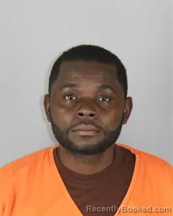 Mugshot of Motima Robert Mulbah booked in Hennepin County, Minnesota on July 26, 2026