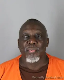 Mugshot of Julius Oyaro Nyamache booked in Hennepin County, Minnesota on July 26, 2026