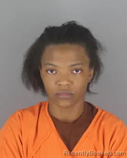 Mugshot of SHAWNIE SHAWNTE MOORE booked in Hennepin County, Minnesota on August 4, 2026