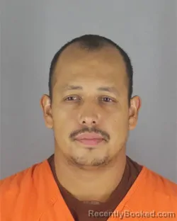 Mugshot of OSCAR JESUS SANTANA-ORNELIAS booked in Hennepin County, Minnesota on August 4, 2026