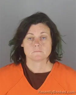 Mugshot of Amanda Jeanne Cross booked in Hennepin County, Minnesota on August 7, 2026