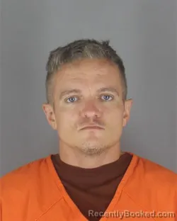 Mugshot of Jacob John Skinner booked in Hennepin County, Minnesota on August 7, 2026