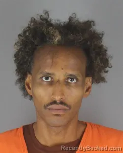 Mugshot of Abdirizak Hussein Mohamed booked in Hennepin County, Minnesota on August 7, 2026