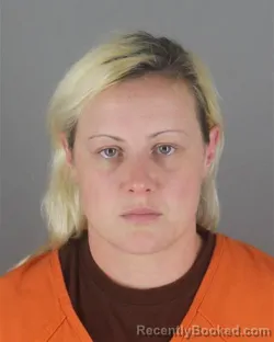 Mugshot of Erin Lillian Piasecki booked in Hennepin County, Minnesota on August 7, 2026