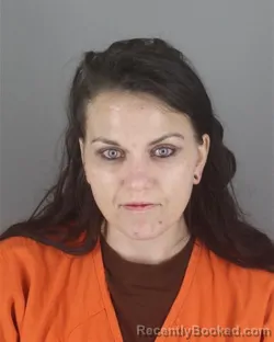 Mugshot of Jessica Victoria Hennessey booked in Hennepin County, Minnesota on August 7, 2026