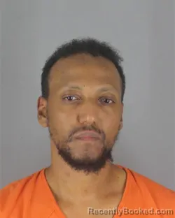 Mugshot of Mustafa Abdeta Dhaba booked in Hennepin County, Minnesota on August 8, 2026