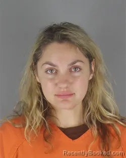 Mugshot of Maggie Ellen Trnka booked in Hennepin County, Minnesota on August 9, 2026