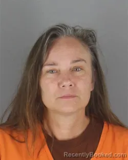 Mugshot of Kimberly Michelle Crow booked in Hennepin County, Minnesota on August 9, 2026