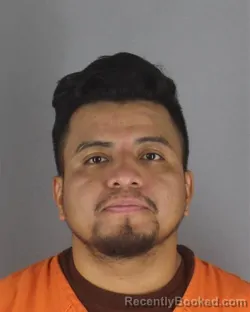 Mugshot of Oscar Fernando Santisteban booked in Hennepin County, Minnesota on August 10, 2026