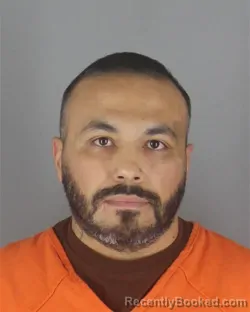 Mugshot of Jared Michael Calderon booked in Hennepin County, Minnesota on August 10, 2026