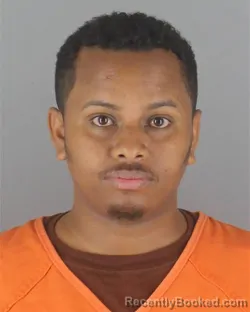 Mugshot of Kadir Mohamed Adem booked in Hennepin County, Minnesota on August 10, 2026