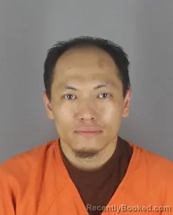 Mugshot of Somong Vang booked in Hennepin County, Minnesota on August 12, 2026