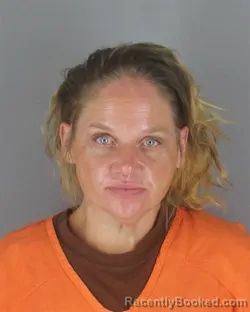 Mugshot of Megan Faye Payne booked in Hennepin County, Minnesota on August 21, 2026
