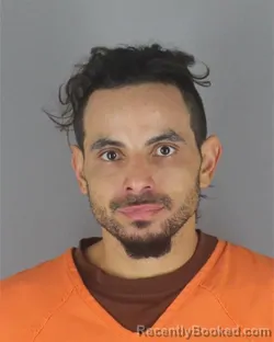 Mugshot of David Marcel Lewis-Alvarez booked in Hennepin County, Minnesota on August 22, 2026