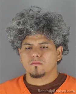 Mugshot of Ivis Adonis Ronquillo Alvarado booked in Hennepin County, Minnesota on August 22, 2026