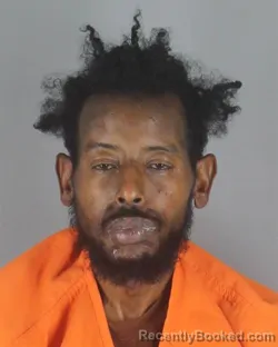 Mugshot of Mohamed Abdala Abdi booked in Hennepin County, Minnesota on August 22, 2026
