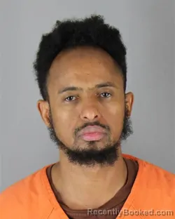 Mugshot of Muzamil Abdulahi Ahmed booked in Hennepin County, Minnesota on August 23, 2026