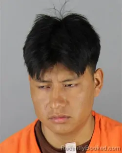 Mugshot of William Ramiro Cuyo Vega booked in Hennepin County, Minnesota on August 23, 2026