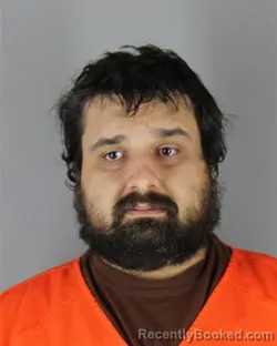 Mugshot of Shahean Michael Cheren booked in Hennepin County, Minnesota on August 23, 2026