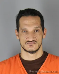 Mugshot of Juan Preze Hernandez booked in Hennepin County, Minnesota on August 24, 2026