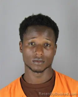 Mugshot of Dennis Mokaya Nyangena booked in Hennepin County, Minnesota on August 24, 2026