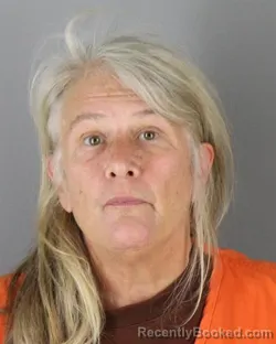 Mugshot of Ellen Margaret Krumholz booked in Hennepin County, Minnesota on August 25, 2026