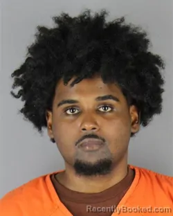 Mugshot of Abdulrahman Tulle Abdi booked in Hennepin County, Minnesota on August 25, 2026
