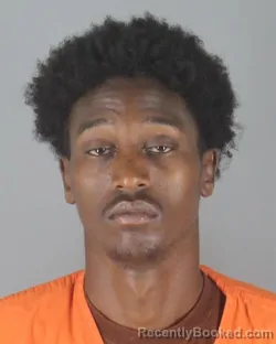 Mugshot of Adam Mohamed Abdi booked in Hennepin County, Minnesota on August 25, 2026