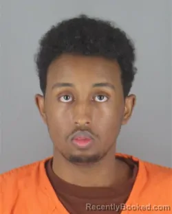Mugshot of Mohameddeq Yusuf booked in Hennepin County, Minnesota on August 25, 2026