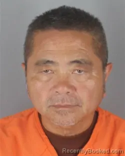 Mugshot of Tung Vinh Truong booked in Hennepin County, Minnesota on August 26, 2026