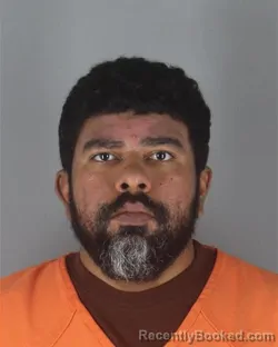 Mugshot of Angel Rafael Ortiz booked in Hennepin County, Minnesota on August 26, 2026